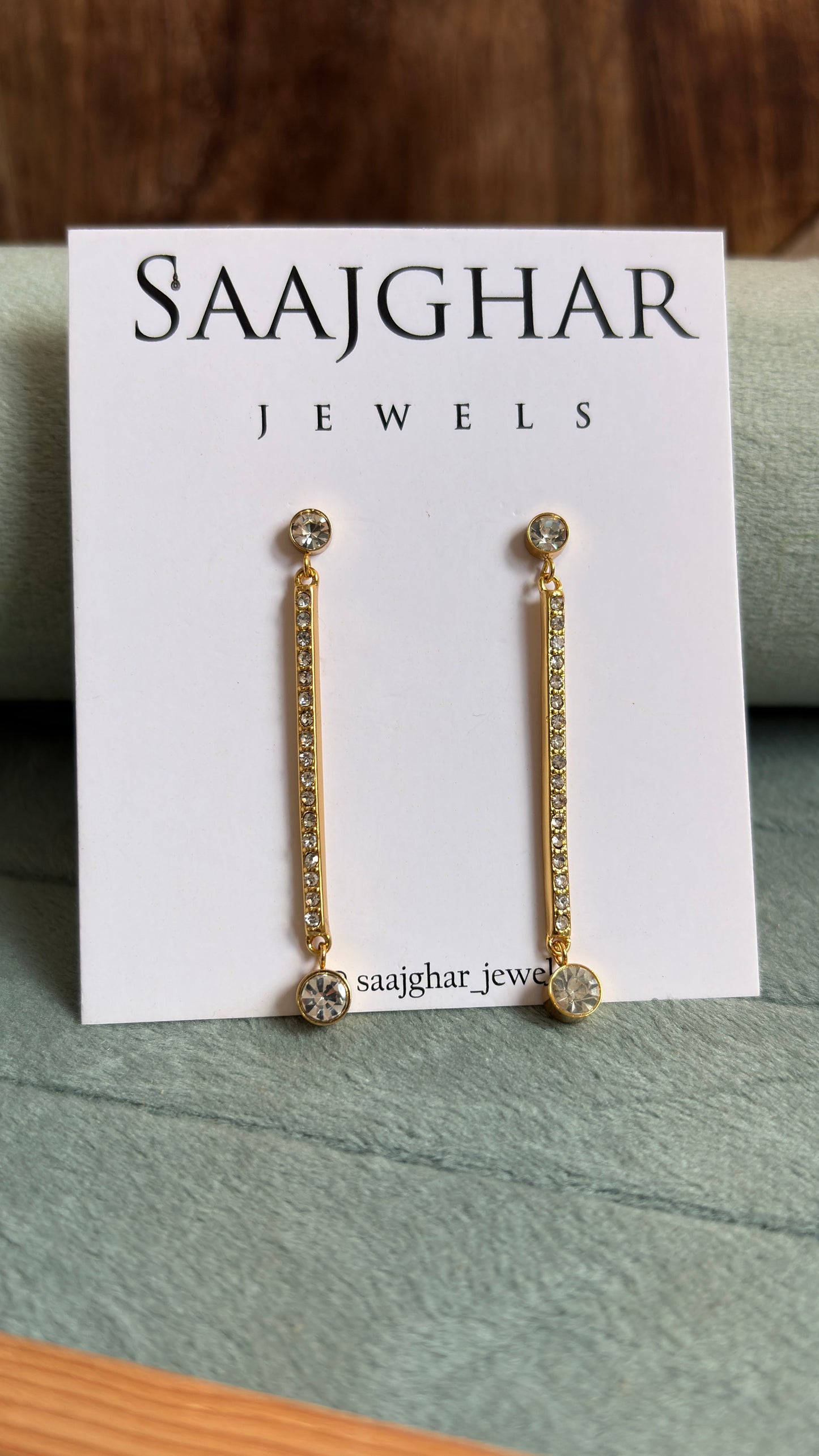 White stone long party wear type earrings