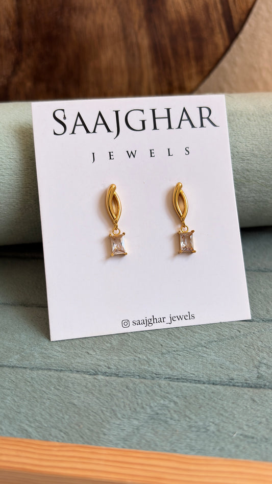 White stone stud type earrings