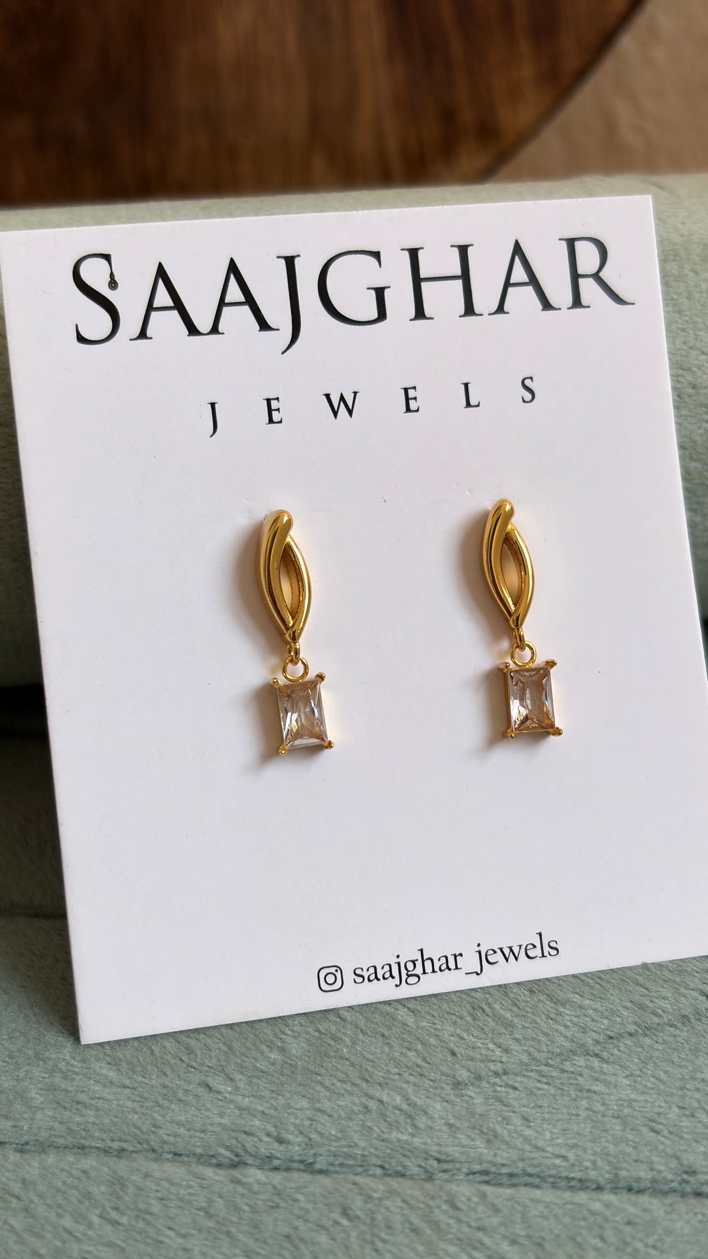 White stone stud type earrings
